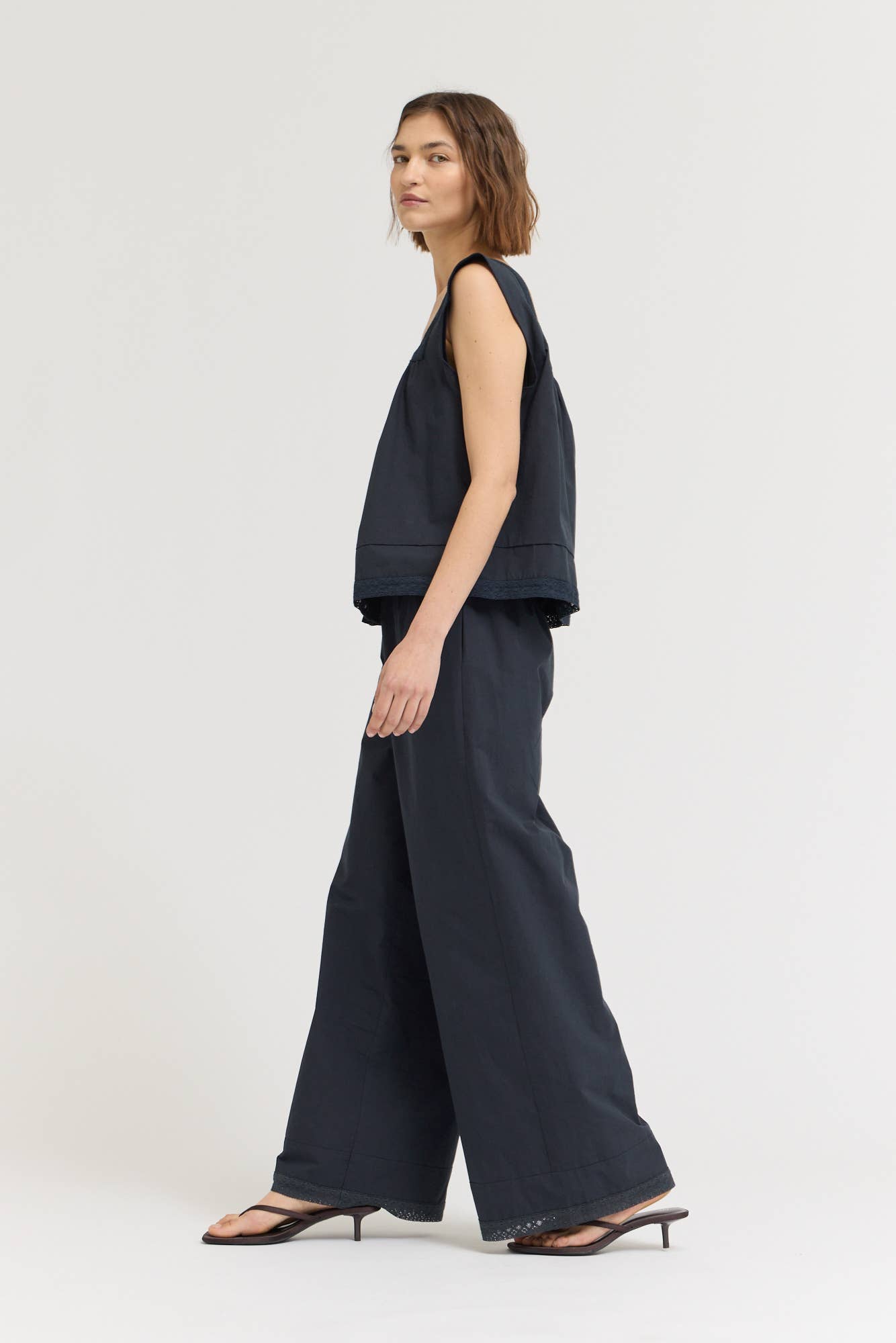 Eyelet Trim Detailed Sleeveless Top