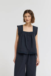 Eyelet Trim Detailed Sleeveless Top