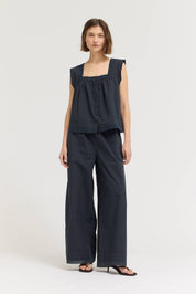 Eyelet Trim Detailed Sleeveless Top