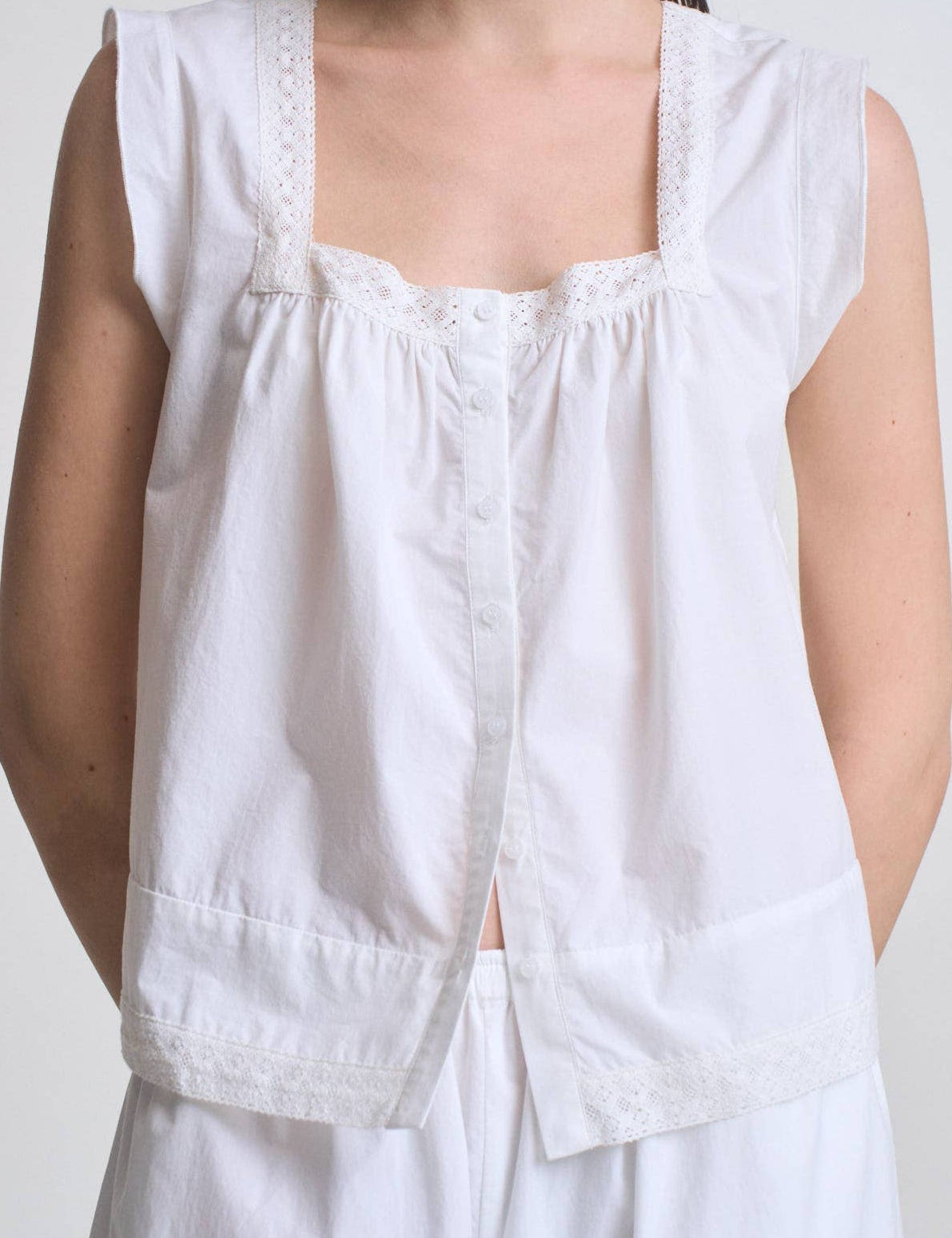 Eyelet Trim Detailed Sleeveless Top