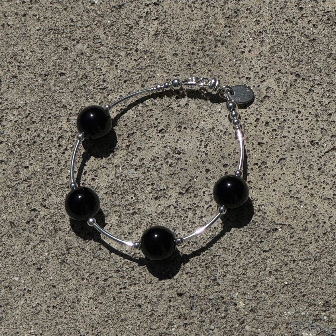 Arc Onyx Bracelet
