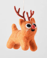 Plush reindeer toy with antlers on a white background.