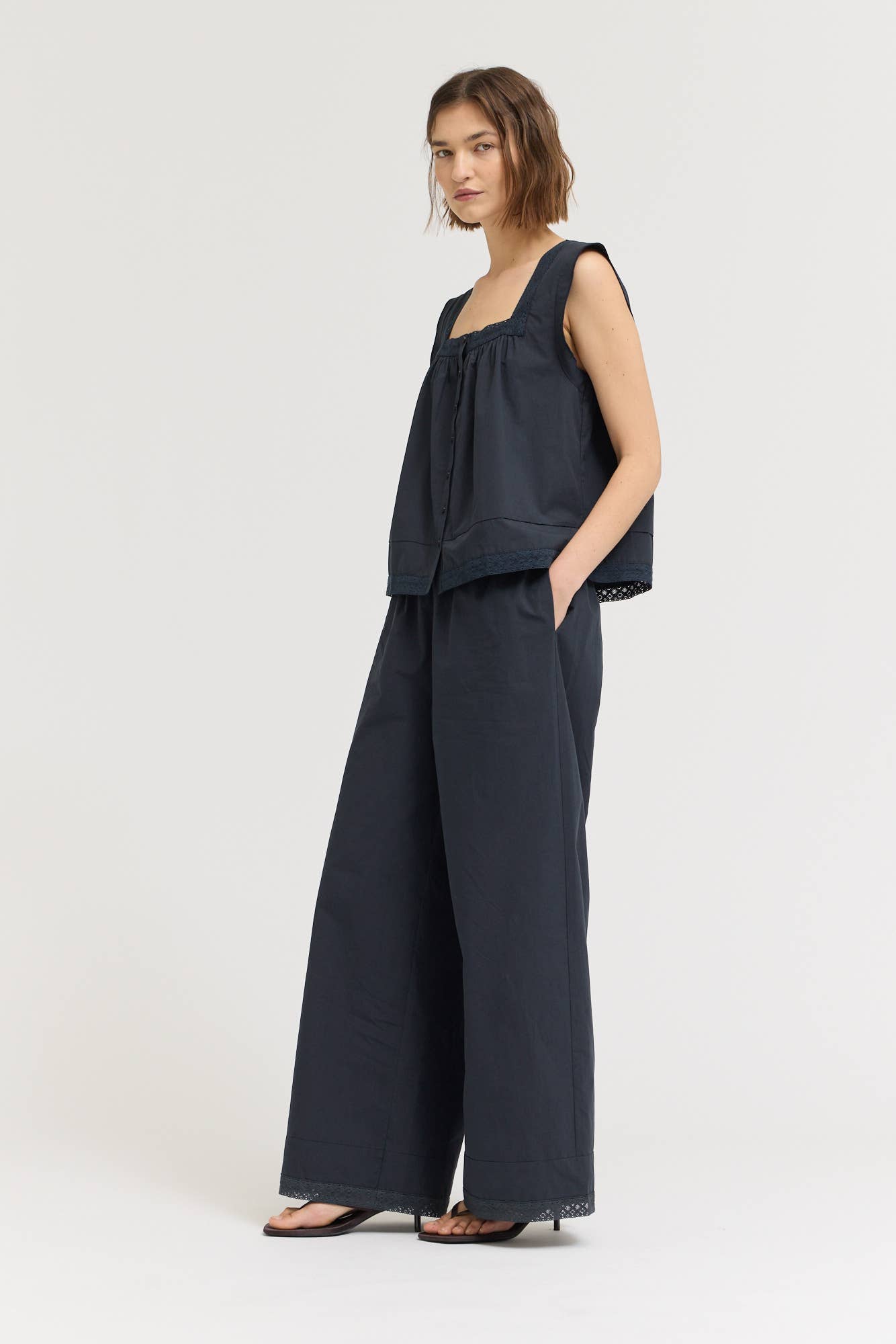 Eyelet Trim Detailed Sleeveless Top