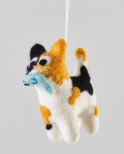 Cat-shaped plush toy with a blue bow tie on a gray background.