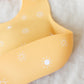 Mushie Silicone Baby Bib - Sun